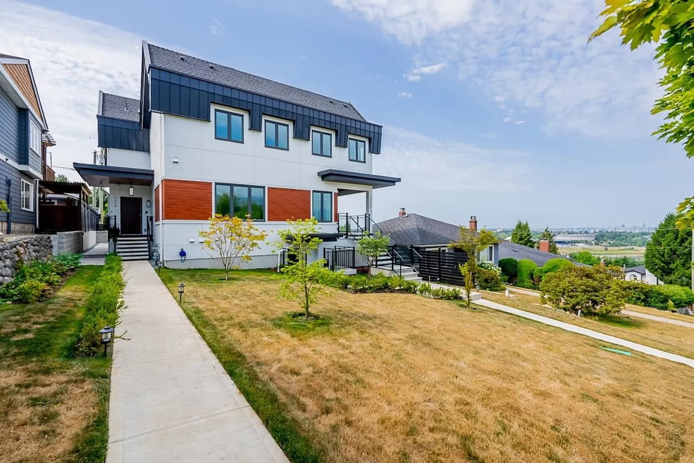 Completed multi-family duplex development at 3636 Trinity St, Vancouver, by BRIO Construction
