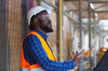 a man wearing safety goggles and a helmet