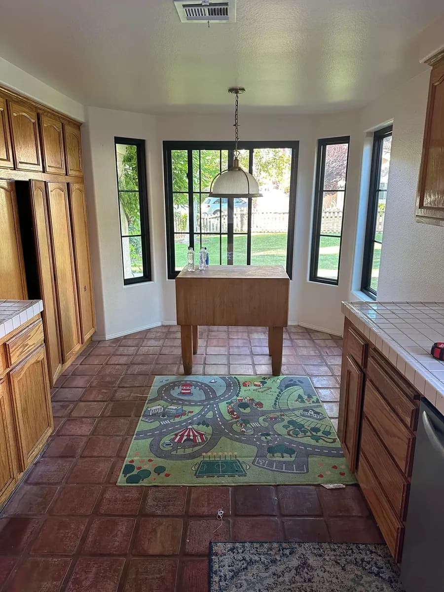 Original 1990s North Vancouver kitchen breakfast area before renovation